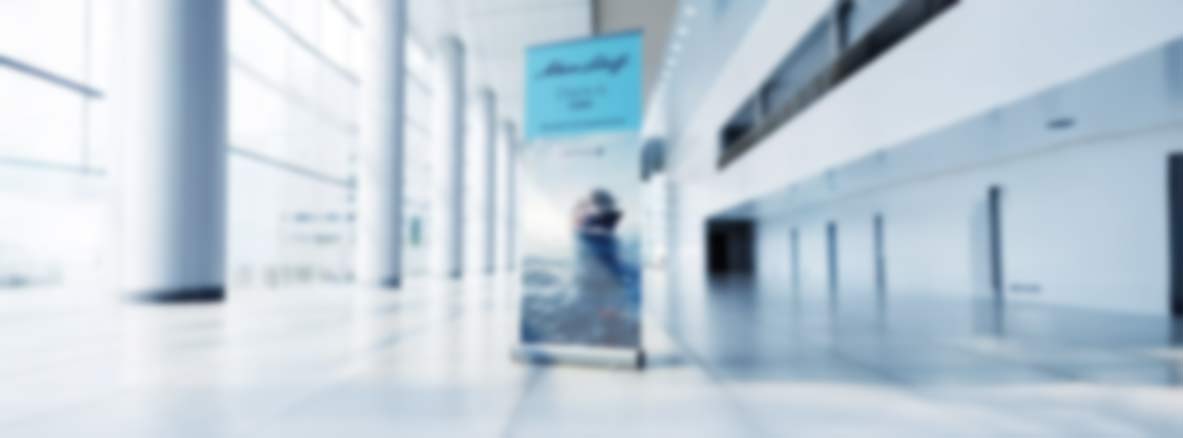 Blured pull up banner Mein Schiff at ASirport